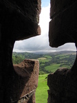 SX16127 View through arrow hole of Carreg Cennen Castle.jpg